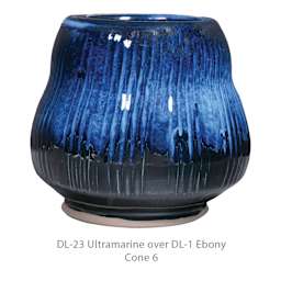 DL-23 Ultramarine over DL-1 Ebony. Cone 6.