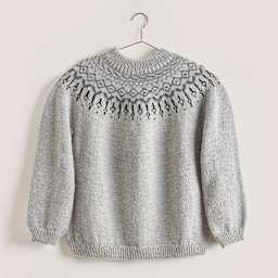 Rico Design Essentials Soft Merino Aran Yarn - Light Grey, 109 yds showing completed sweater project