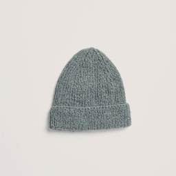 Rico Design Soft Alpaca Yarn - Blue, 137 yds showing completed hat project