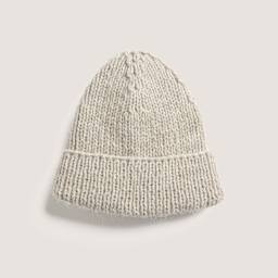 Rico Design Soft Alpaca Yarn - Beige, 137 yds showing completed hat project