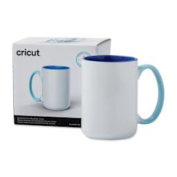 Cricut Mug Blank - Beveled, 15 oz, Ocean, in front of the packaging. 