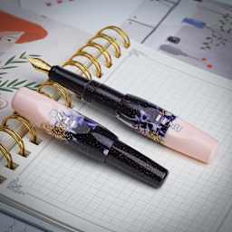Benu Pixie Fountain Pen - Plum Cream, pen laid out (image may show a different size nib)
