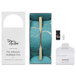 Tom's Studio Lumos Pro Refillable Single Tip Pen - Brass, pen in packaging and contents laid out