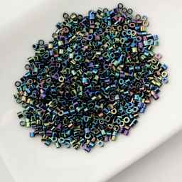 John Bead Cylin 11/0 Cylindrical Seed Beads - Black AB held in dish