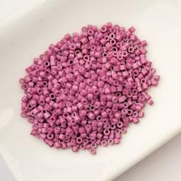 John Bead Cylin 11/0 Cylindrical Seed Beads - Vintage Rose Opaque sitting in dish