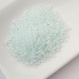 John Bead Cylin 11/0 Matte Macaron Cylindrical Seed Beads - Soft Blue AB sitting in dish