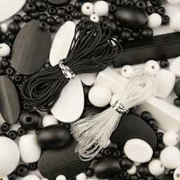 John Bead Wood Craft Beads - White and Black, 90 g Bag showing included nylon cords