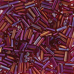 John Bead Czech Glass #3 Bugle Beads - Transparent Red Iris close up