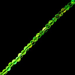 John Bead Crystal Lane DIY Glow in the Dark Round Bead Strand - Orange AB, 7 in showing glow effect