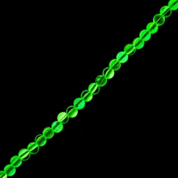 John Bead Crystal Lane DIY Glow in the Dark Round Bead Strand - Green AB, 7 in showing glow effect