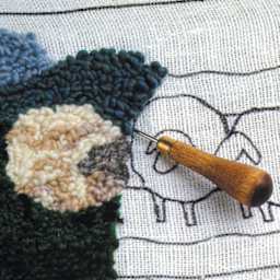 Friendly Loom Discover Rug Hooking Kit - Sheep, 5" x 7" close up of sheep being completed