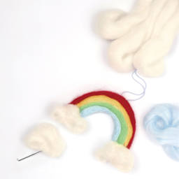 Folia Rainbow Felting Wool - Set of 12 Colors, 350 g showing completed rainbow project