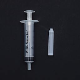 Private Reserve Ink Essentials Standard Kit 1, single syringe and cartridge against black background