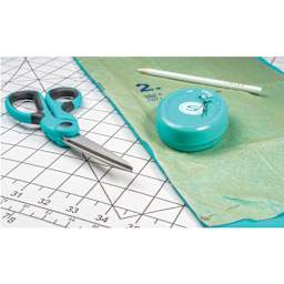 Singer ProSeries Heavy Duty Bent Scissors - 9.5" laying on table