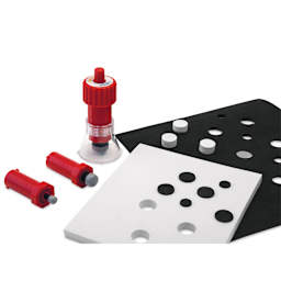 Logan Cos-Tools Hole Drill, next to foam boards