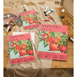 Fabriano Tela Oil Painting Pads, on table with oil paints and brushes