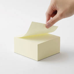 Midori MD Memo Block - 3.9" x 3.9", Grid, White, sheet being lifted