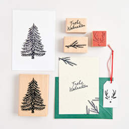 Rico Design Paper Poetry Stamp - Fir Tree shoing completed projects with other stamps (sold seperately)