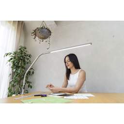 Daylight Slimline 4 LED Table Lamp - Brushed Steel - in use, close-up
