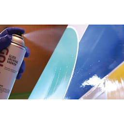 Golden MSA Archival Spray Varnish being applied to artwork.