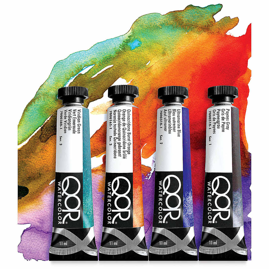 Open in modal - QoR Modern Watercolors - Assorted tubes against multi-colored painted background.