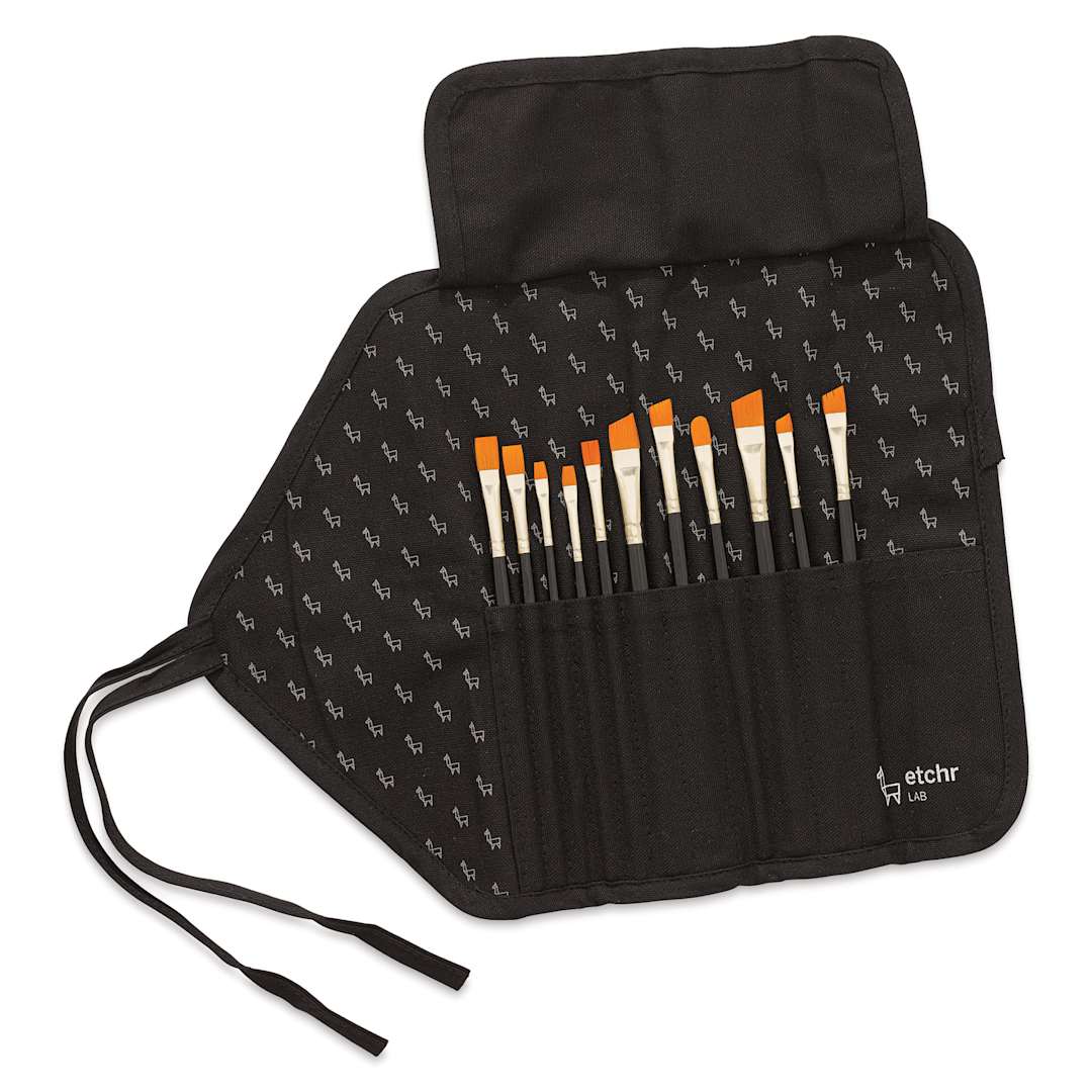 Open in modal - Etchr Roll-Up Brush Pouch - Black, holding brushes (not included)