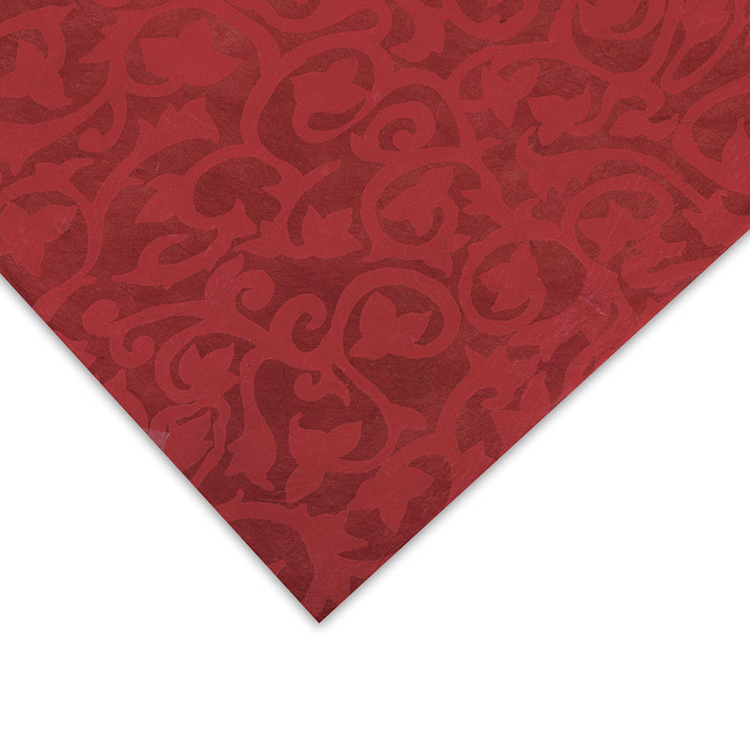 Open in modal - Nepalese Lokta Flower Print Paper - Closeup of corner of Red sheet showing color and texture
