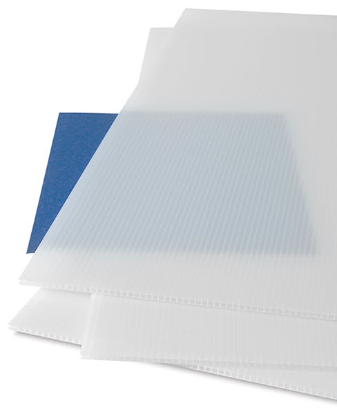 Open in modal - Corrugated Plastic Panels - Several Translucent panels on a Blue paper to show transparency