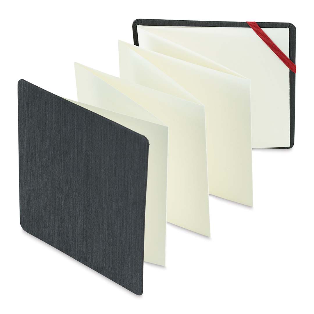 Open in modal - The ZigZag Book - 5.5" square book upright and slightly opened showing zigzag pages