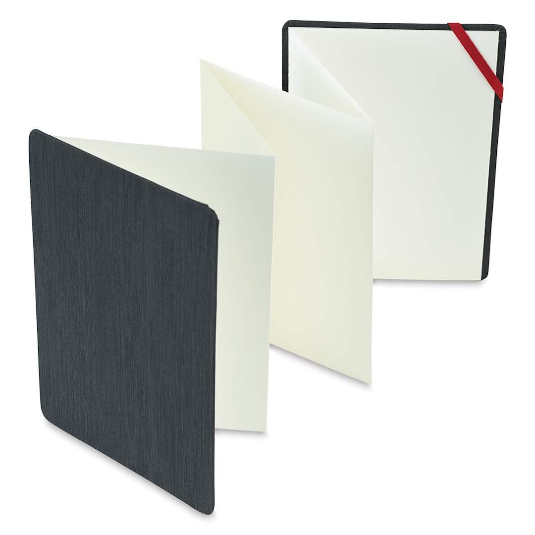 Open in modal - The ZigZag Book - 5.8" x 8.3" book upright and slightly opened showing zigzag pages