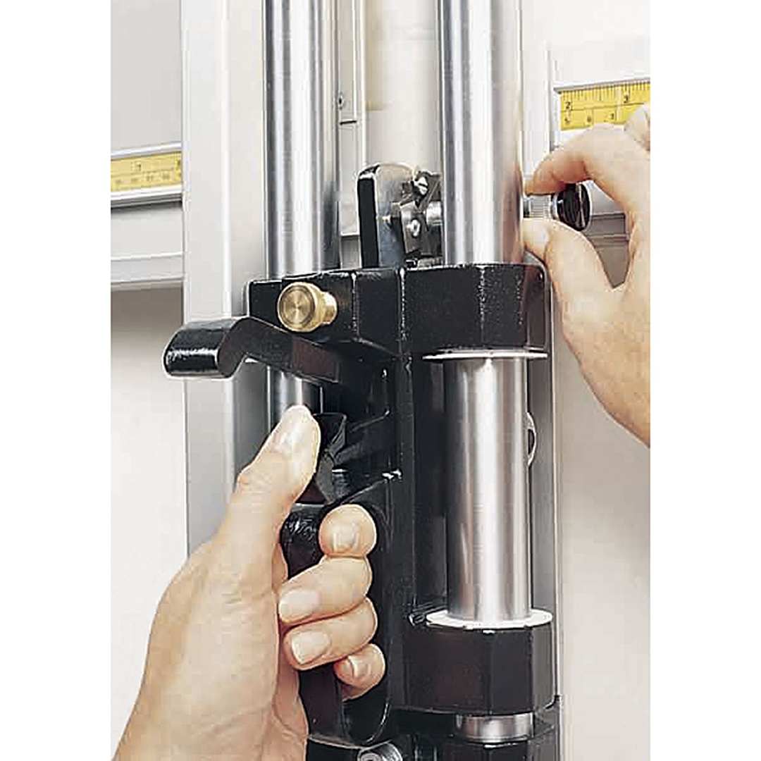 Open in modal - Fletcher 3000 Multi-Material Wall-Mount Cutter - Hands shown adjusting mounted Cutter