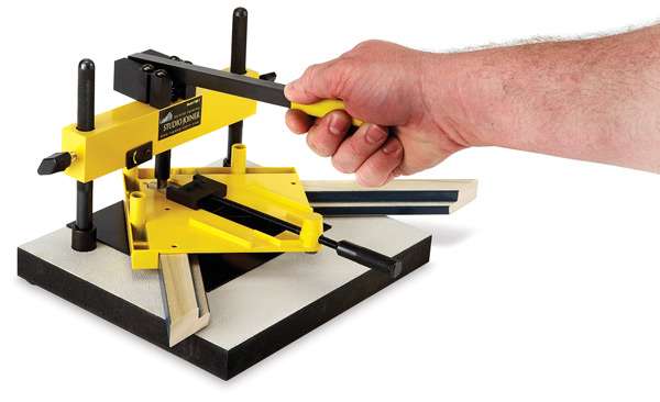 Open in modal - Studio Framing Joiner - Artist joining two pieces of frame with Joiner