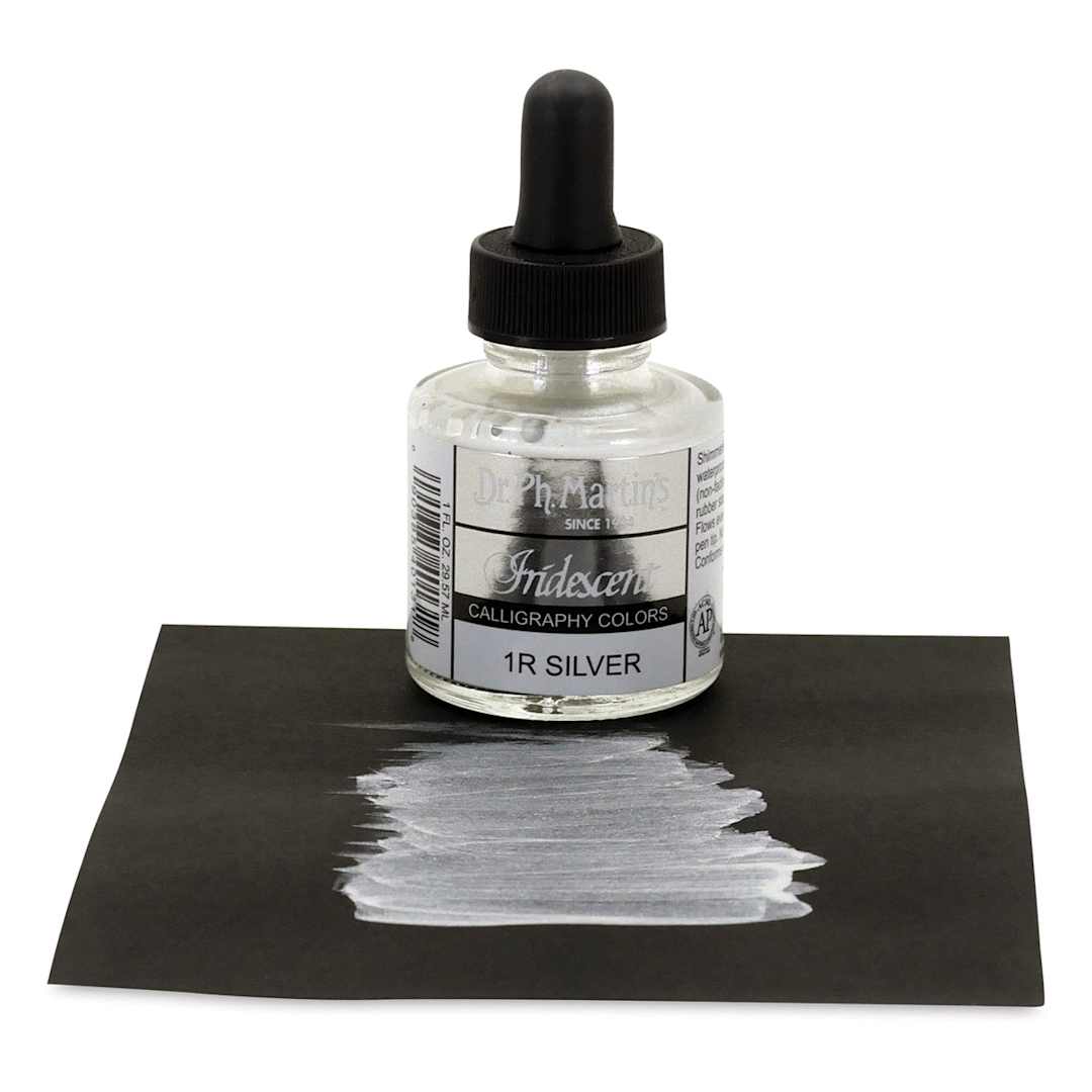 Open in modal - Dr. Ph. Martin's Iridescent Calligraphy Ink - 1 0z Silver bottle on paper with swath of ink