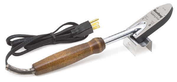 Open in modal - Sealector III Tacking Iron - Resting on stand with wrapped cord shown