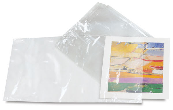 Open in modal - Mountex Archival Shrink Wrap Bags - Stack of Bags with one holding artwork
