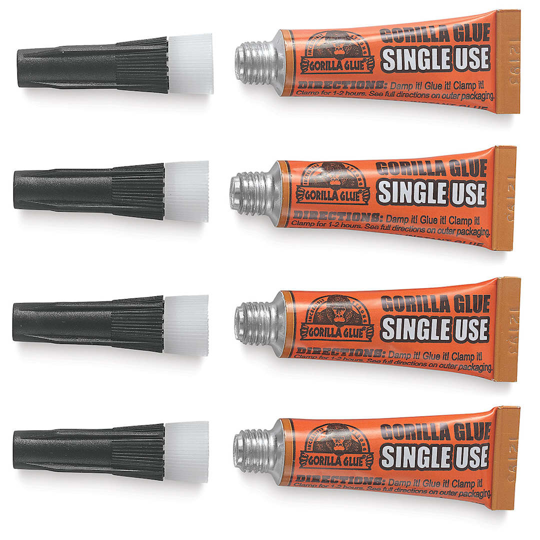 Open in modal - Gorilla Glue - components of 4 Single Use Tubes shown horizontally with caps removed