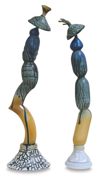 Open in modal - Amaco Textured Alligator Liquid Glaze - Two statues showing finished glaze effect