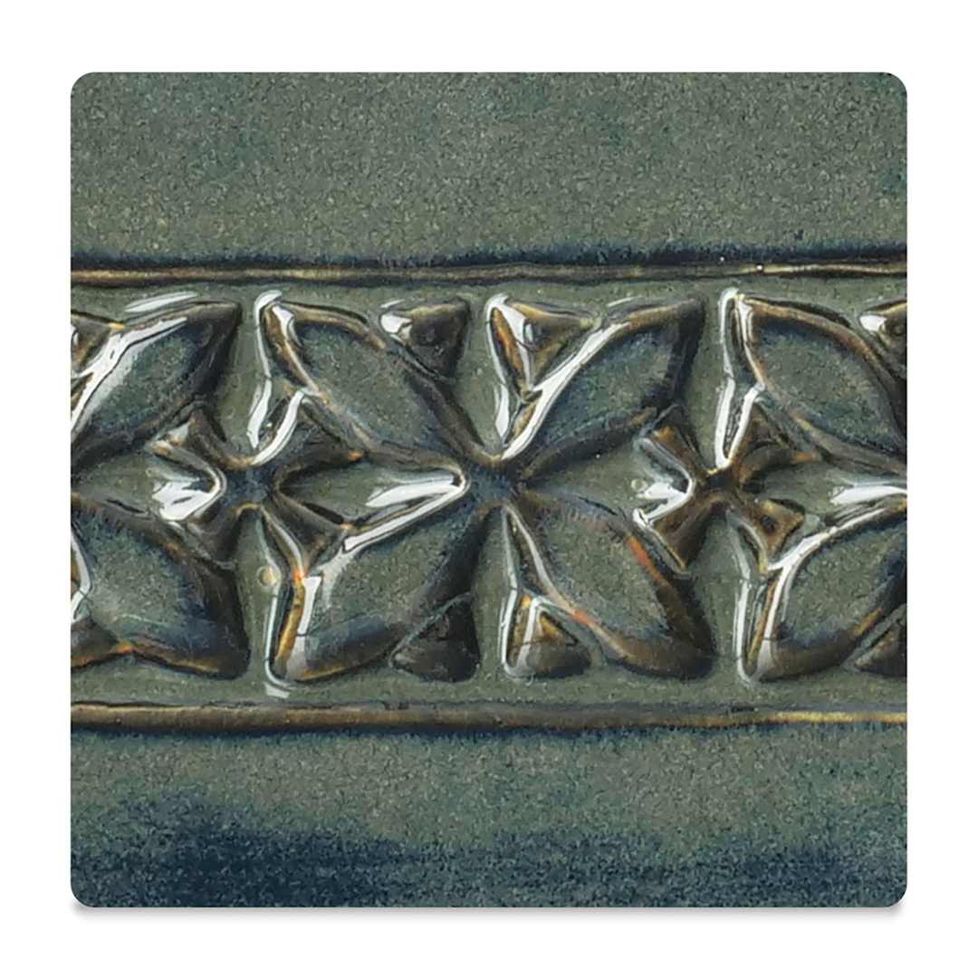 Open in modal - Amaco Potter's Choice Glazes - River Rock,  PC-67. Color sample in blue-green shades.