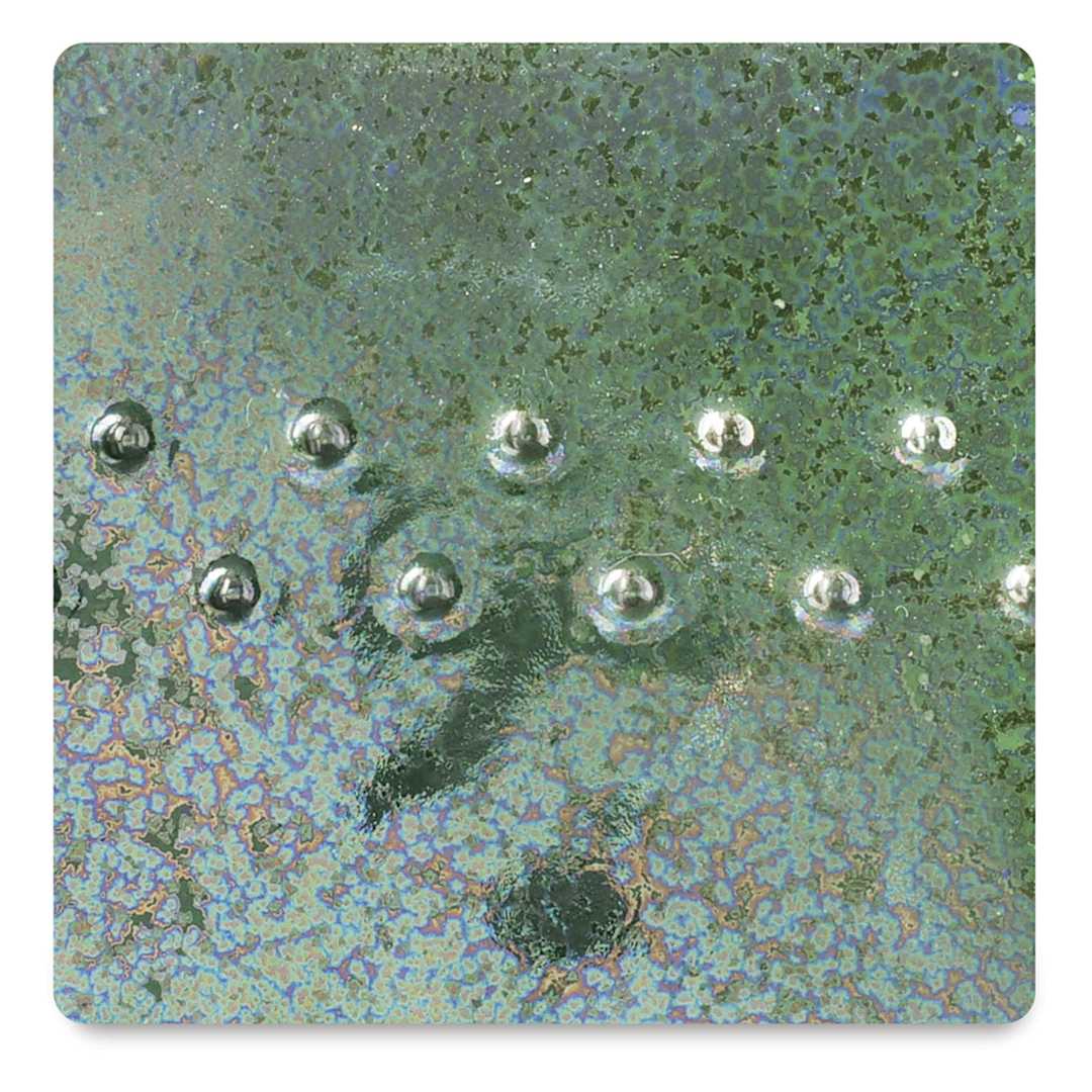 Open in modal - Amaco Potter's Choice Glazes - June Bug, PC-10. Color sample with blue-green-golden variations.