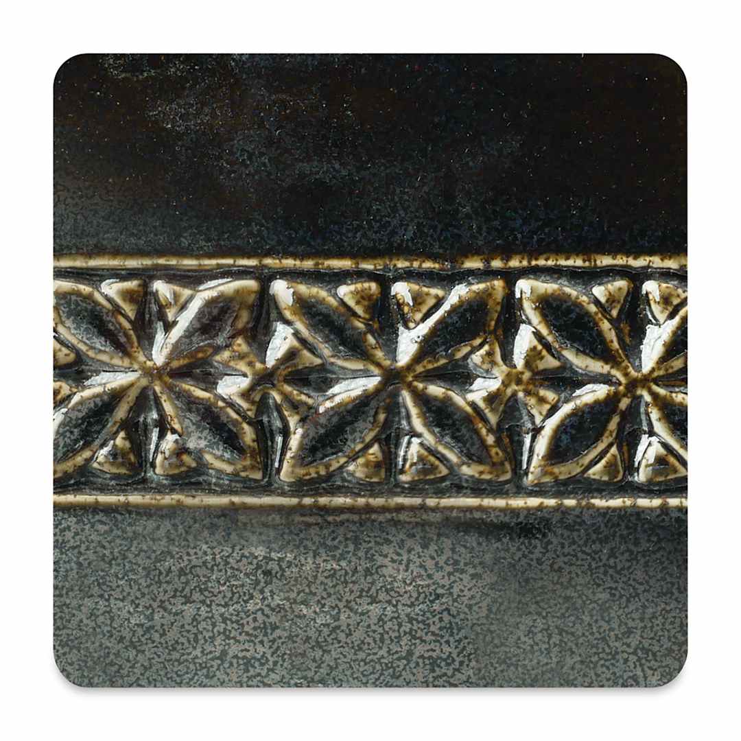 Open in modal - Amaco Potter's Choice Glaze - Cosmic Oilspot. A dark glaze with shimmery flecks that create an oilspot effect.