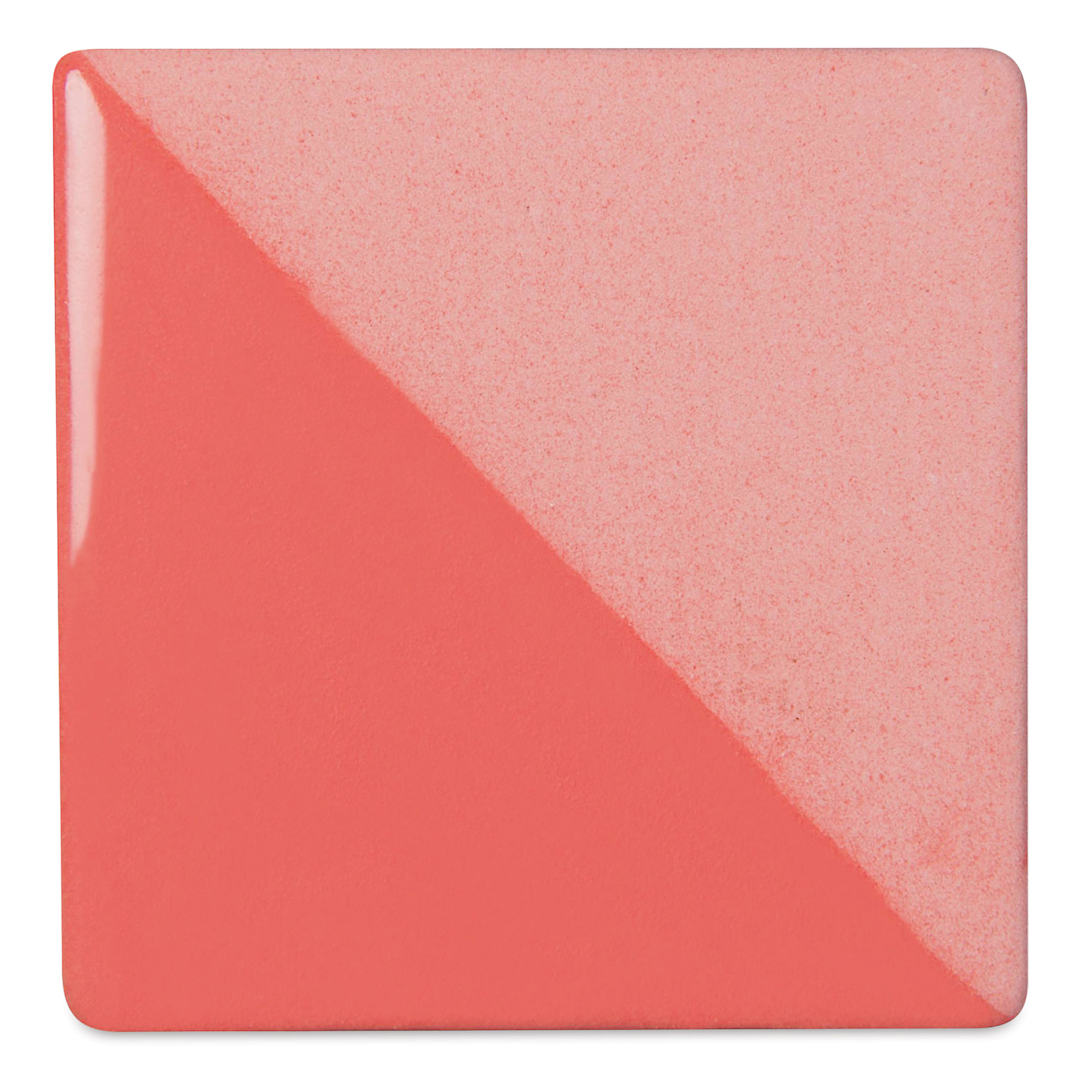 Open in modal - Speedball Ceramic Underglaze - Pink, Opaque, fired on white clay bisque tiles, half covered in Speedball Clear Glaze, fired to cone 05