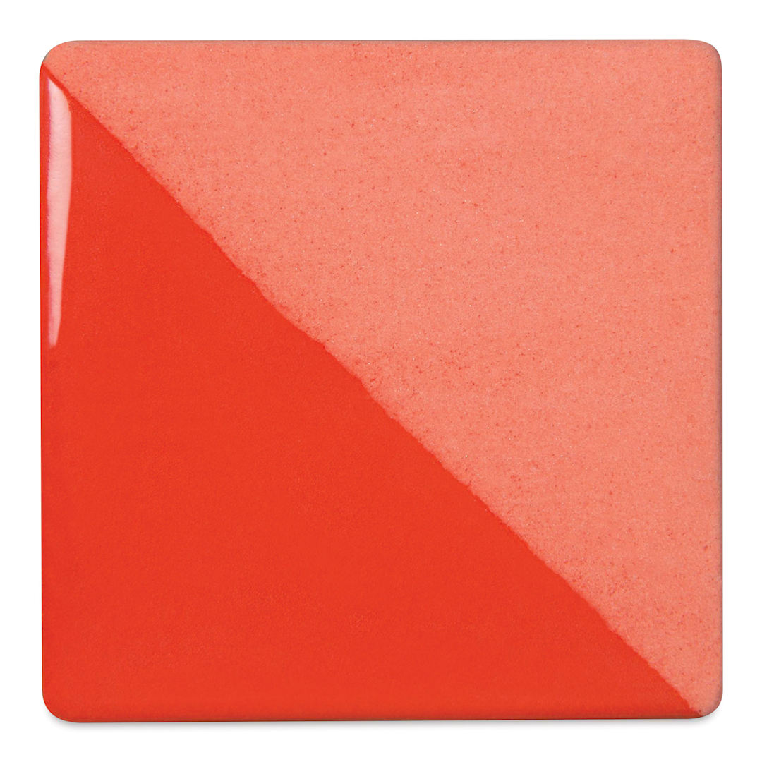 Open in modal - Speedball Ceramic Underglaze - Flame Red, Opaque, fired on white clay bisque tiles, half covered in Speedball Clear Glaze, fired to cone 05