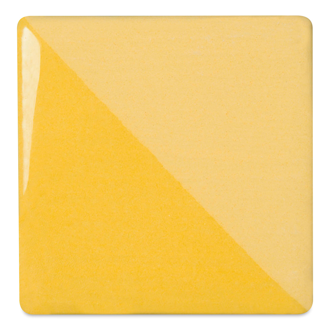 Open in modal - Speedball Ceramic Underglaze - Yellow, Opaque, fired on white clay bisque tiles, half covered in Speedball Clear Glaze, fired to cone 05