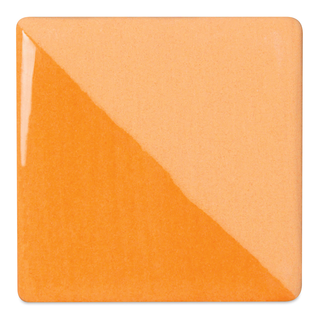 Open in modal - Speedball Ceramic Underglaze - Yellow Orange, Opaque, fired on white clay bisque tiles, half covered in Speedball Clear Glaze, fired to cone 05