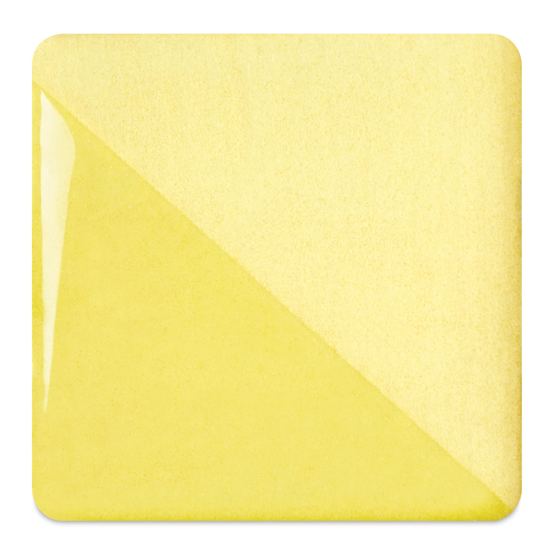 Open in modal - Speedball Ceramic Underglaze - Spring Yellow, fired on white clay bisque tiles, half covered in Speedball Clear Glaze, fired to cone 05