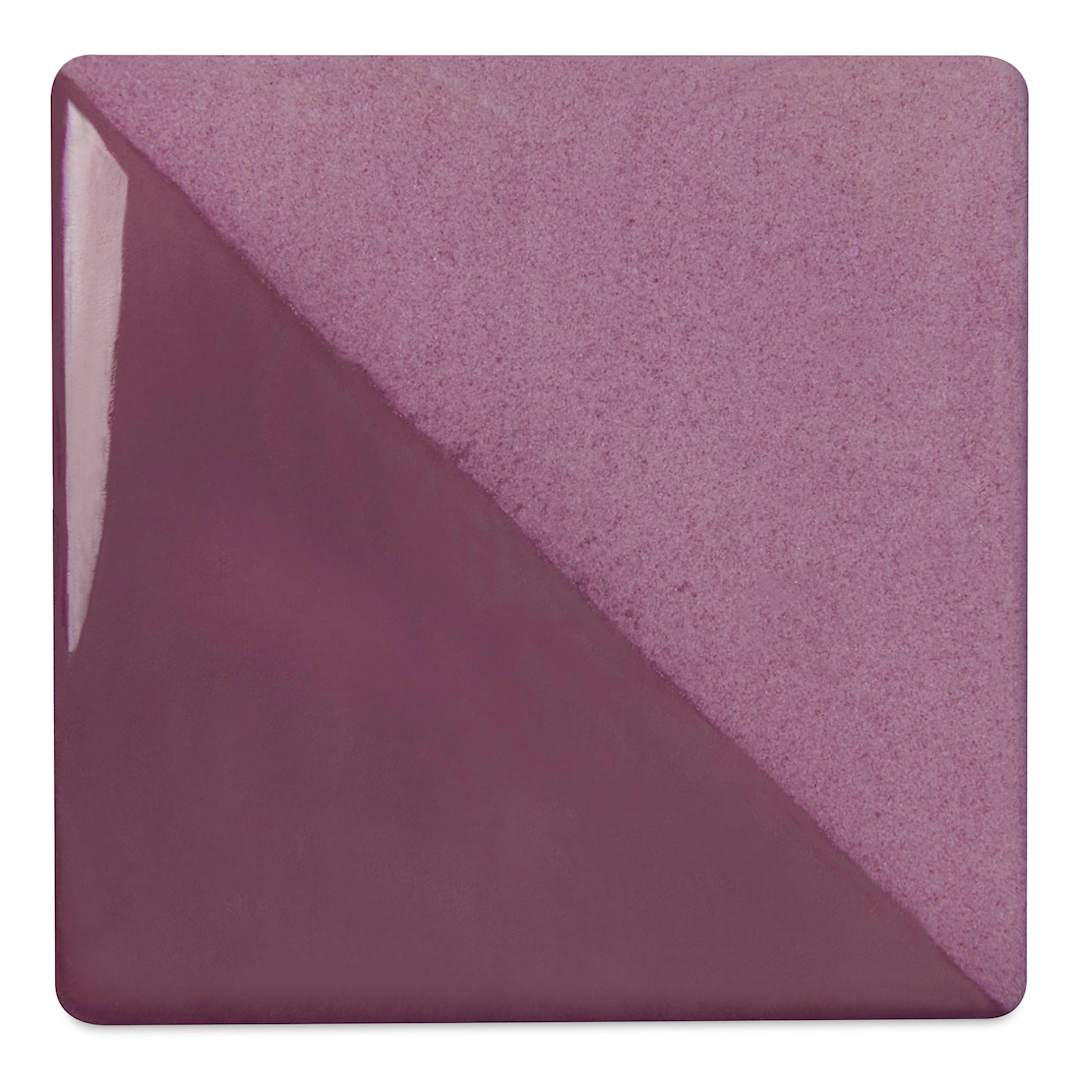 Open in modal - Speedball Ceramic Underglaze - Purple, Opaque, fired on white clay bisque tiles, half covered in Speedball Clear Glaze, fired to cone 05