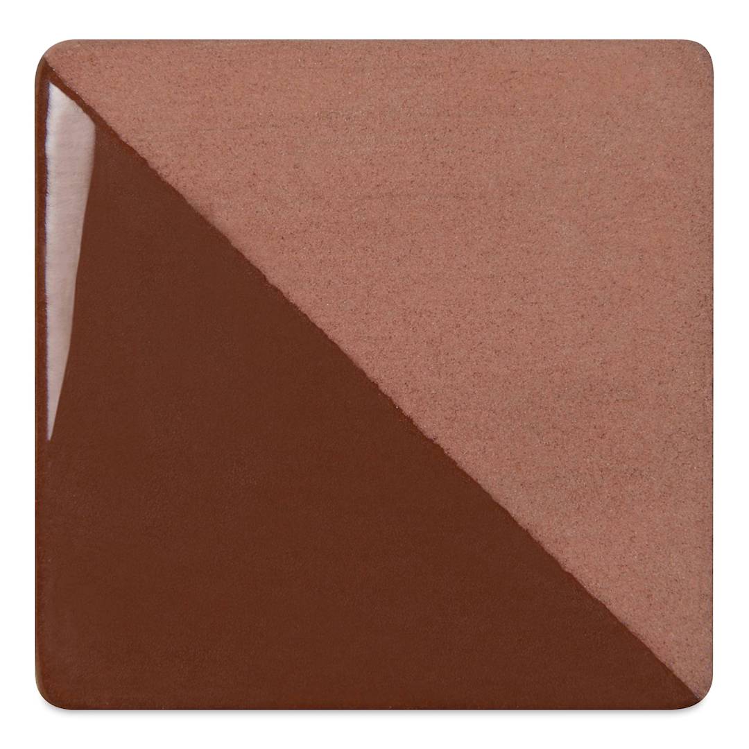 Open in modal - Speedball Ceramic Underglaze - Brown, Opaque, fired on white clay bisque tiles, half covered in Speedball Clear Glaze, fired to cone 05