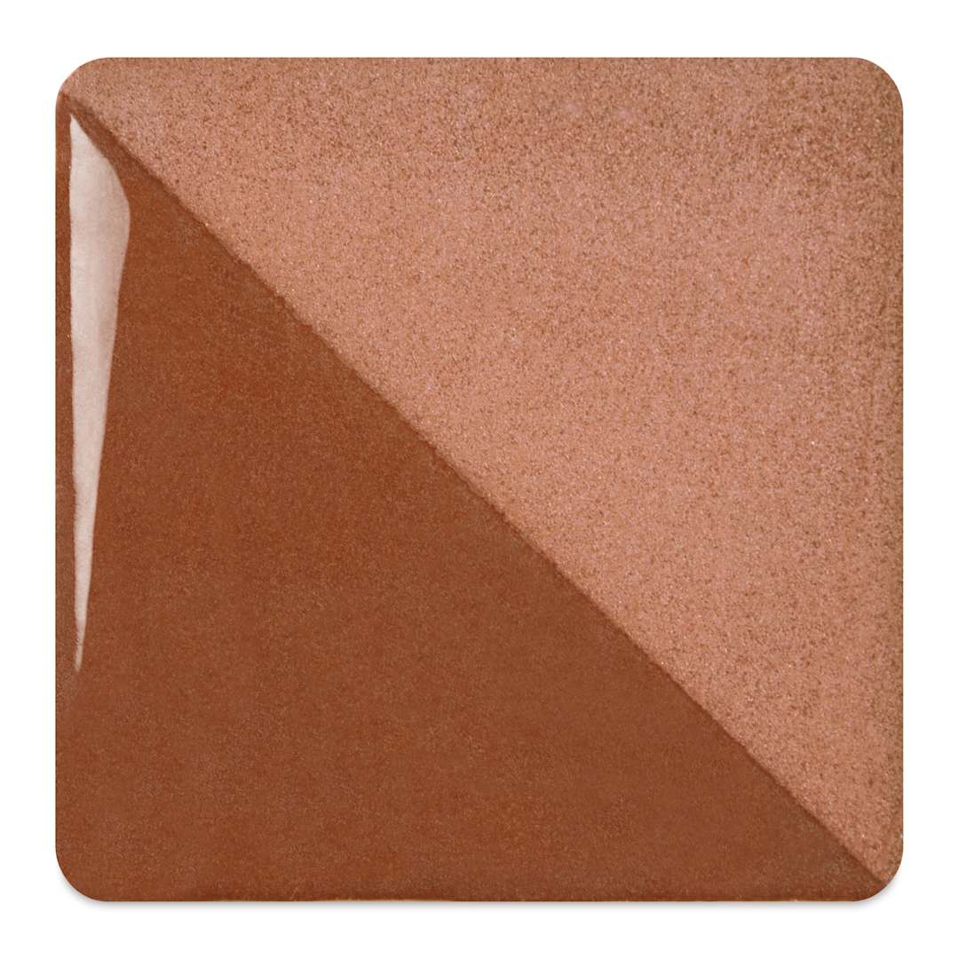 Open in modal - Speedball Ceramic Underglaze - Chocolate, fired on white clay bisque tiles, half covered in Speedball Clear Glaze, fired to cone 05