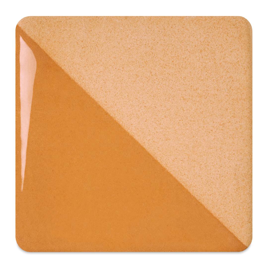 Open in modal - Speedball Ceramic Underglaze - Caramel, fired on white clay bisque tiles, half covered in Speedball Clear Glaze, fired to cone 05