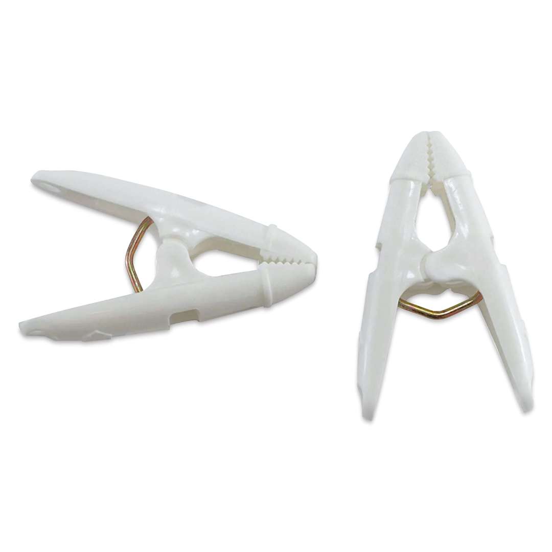 Open in modal - StikkiWorks Grid Ceiling Hanglers Clothes Pin Clamps, close up of individual clamps. 